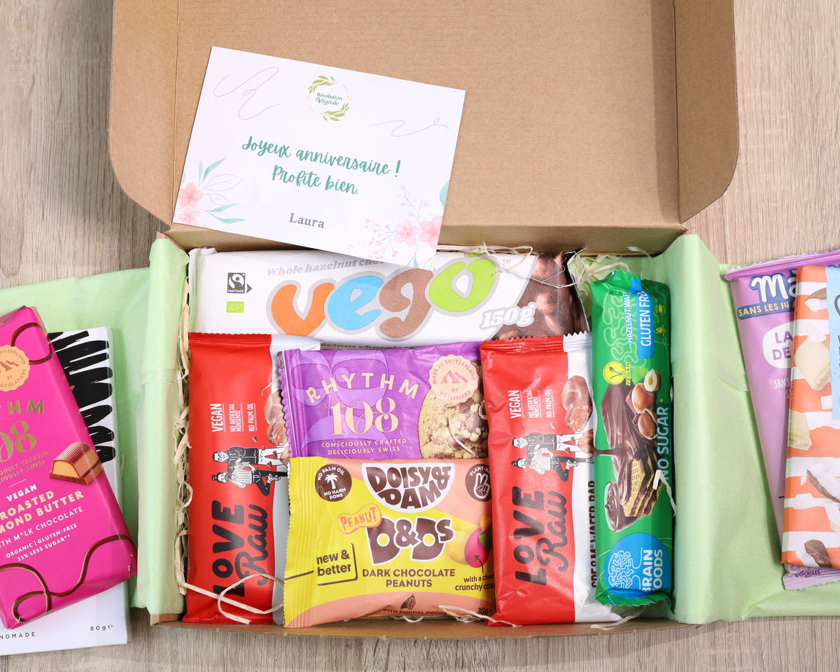 Grande box chocolat ouverte avec produits à l'intérieur